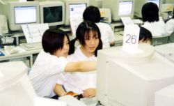 Japanese Schoolgirls at the Computer